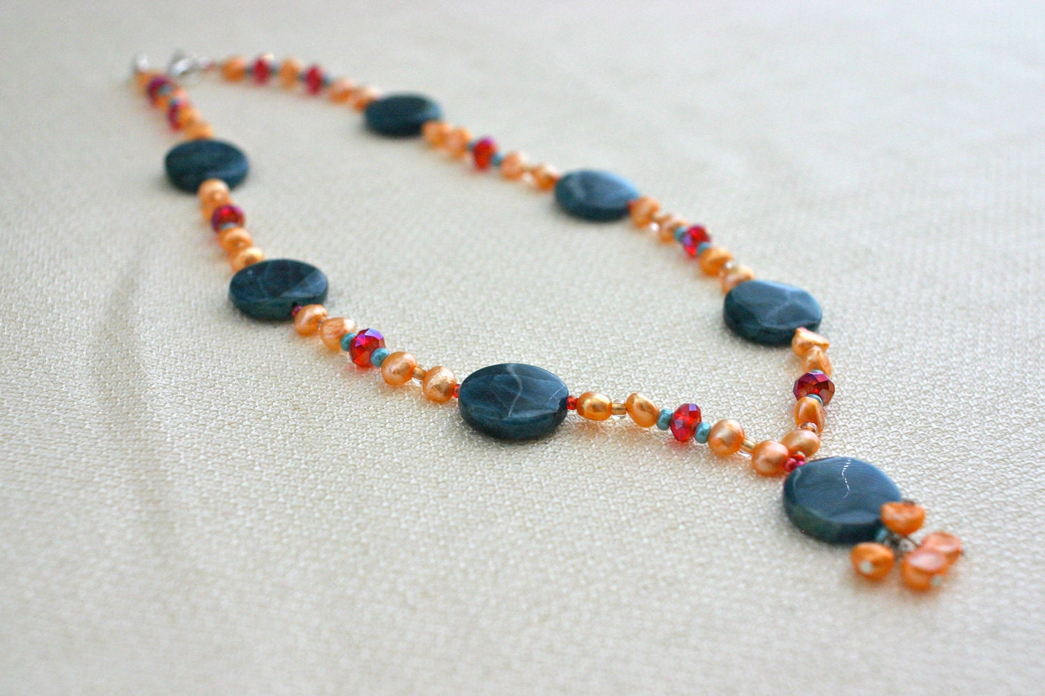 Photo: Teal Blue and Peach Gemstone and Pearl Necklace - Apatite, Freshwater pearl, Crimson, Coral, Turquoise, Deep Sea Blue by andreaturinijewelry