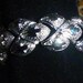 Silver CORO Pegasus U. S. patent pending link bracelet with fold over clasp and safety chain