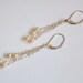 White Pearls Silver Tassel Earrings