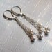 White Pearls Silver Tassel Earrings