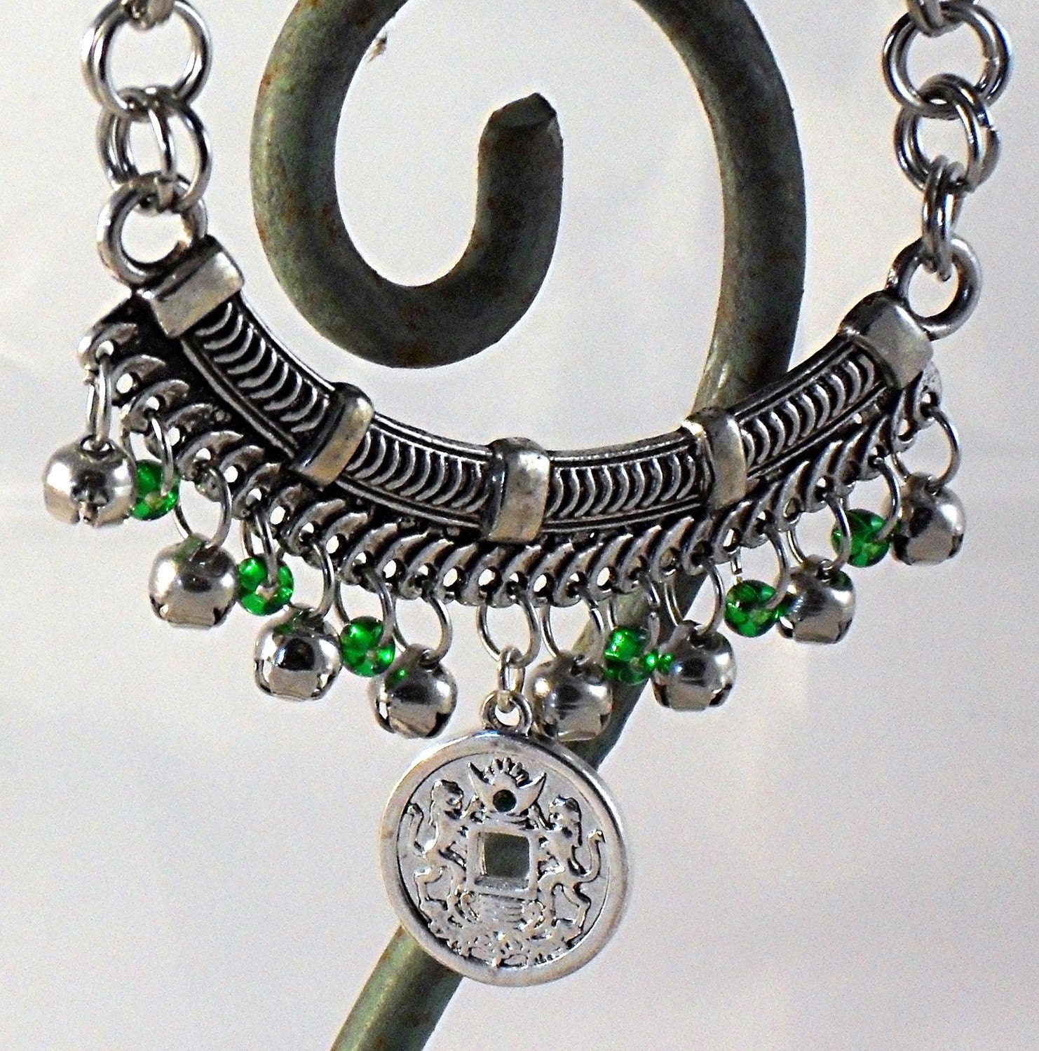 Handmade green and silver chainmail necklace with oriental charm