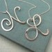 Calligraphy Initial Necklace in sterling silver