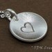 Heart in a disc sterling silver pendant with chain