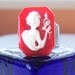 Vintage red glass woman with flower ring - adjustable