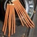 truth be told - long leather earrings - saddle tan fringe suede
