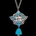 Rhinestone Buddha, Vintage rhinestone pendant is embellished with clear bright rhinestones and turquoise colored, stone scarab beetles