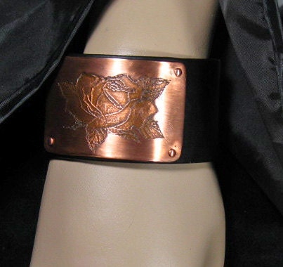 Leather cuff with etched copper rose by RadiantOriginals on Etsy from etsy.com