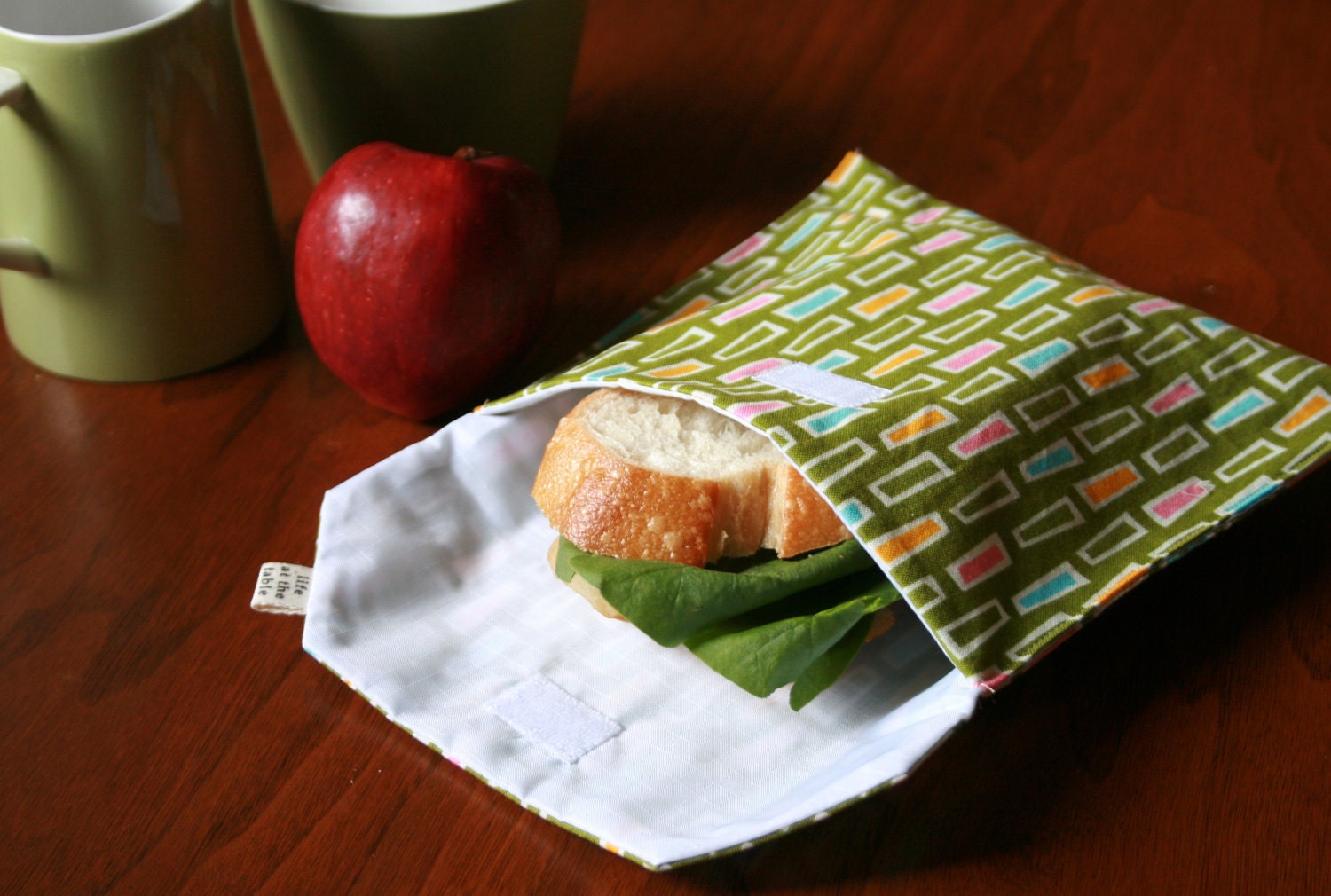 pair of reusable, lined sandwich bags in fruits & geometric