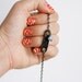 Bracelet with chocolate handmade leather piece and cristal charm Ranguï-Kuyen