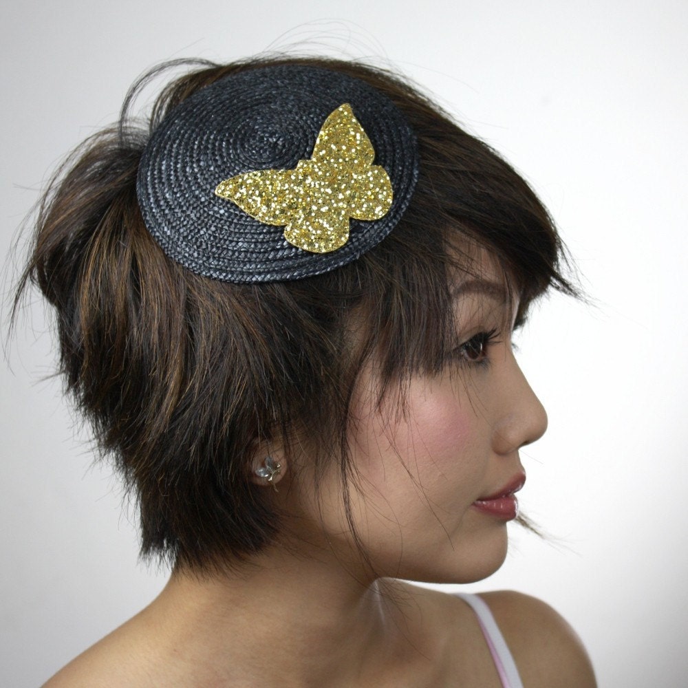 Fascinator black with gold glitter butterfly in straw