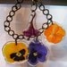 Bracelet with 4 unique in size pressed flowers covered In epoxy resin-jewelry