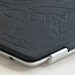 Embossed leather "Electric Library" smart cover for iPad 2 (Black)