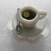Tiny Miniature Tea Cup Ring with a tiny floating by PinkFrog4U from etsy.com