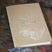 stack of vintage suitcases - hand drawn, hand bound blank kraft notebook sketchbook jotter