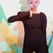 black sweater --epaulette detail with red button, draped collar, super long sleeves, warm and fancy.
