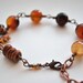 Amber Bracelet with Copper Spiral