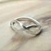 Infinity Sterling Ring in Elegant Style by NingSterling on Etsy from etsy.com