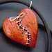 Stitched Heart Pendant hand carved in African Paduak