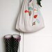cotton market tote bag with rust & teal leaves