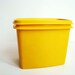 Yellow-Orange Tupperware Container