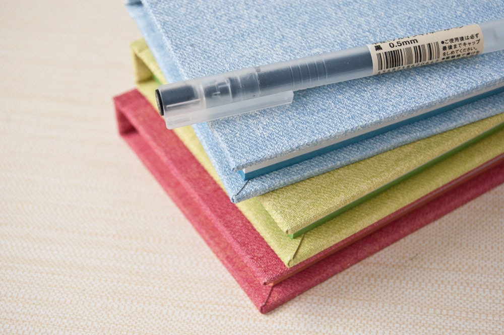 Recycled handbound pocket notebook with vinyl cover