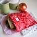 pair of reusable, lined sandwich bags in red paisley & strawberries