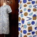 1950s dress / 50s housedress day dress / nuts nutcracker novelty print blue / medium large