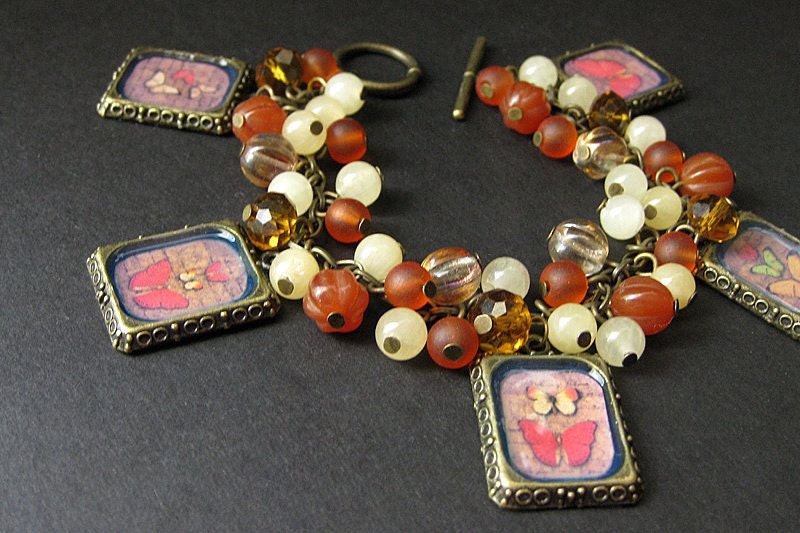 Butterfly Charm Bracelet Beaded in Autumn Colors of Cream, Orange and Bronze. Handmade Jewelry by Gilliauna.