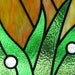 Spilling Moons - stained glass panel