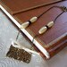 Vintage Look Necklace - Gold floral stamping, ivory faux pearl and brass chain
