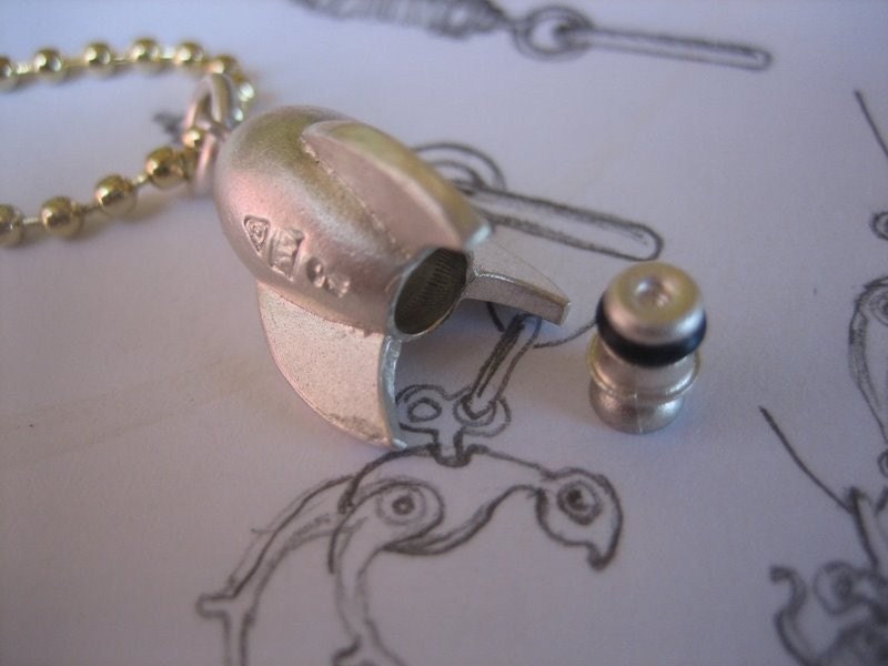 Sterling silver rocket locket, rubber seal