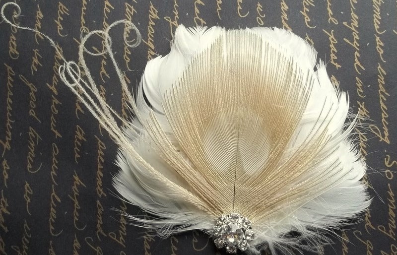 Phoebe Ivory feather bridal hair fascinator with bleached ivory peacock 