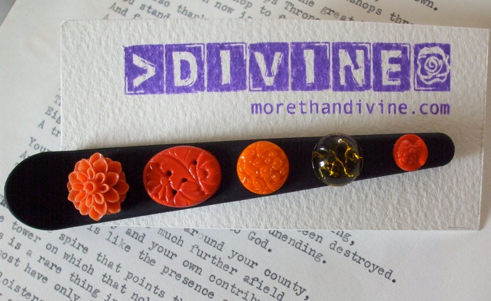 Orange matt black decorated hair clip From morethandivine