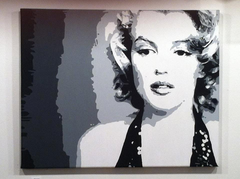 It is a pop art portrait of Marilyn Monroe done in black and white