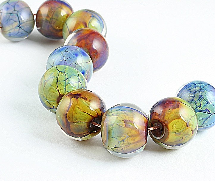 Fun. Small encased silver glass beads. Lisa Fletcher Glass beads