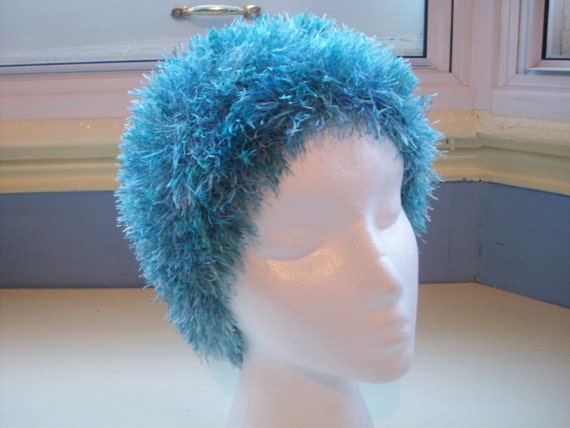 Wool free fun turquoise knit beanie hat with a by SpinningStreak