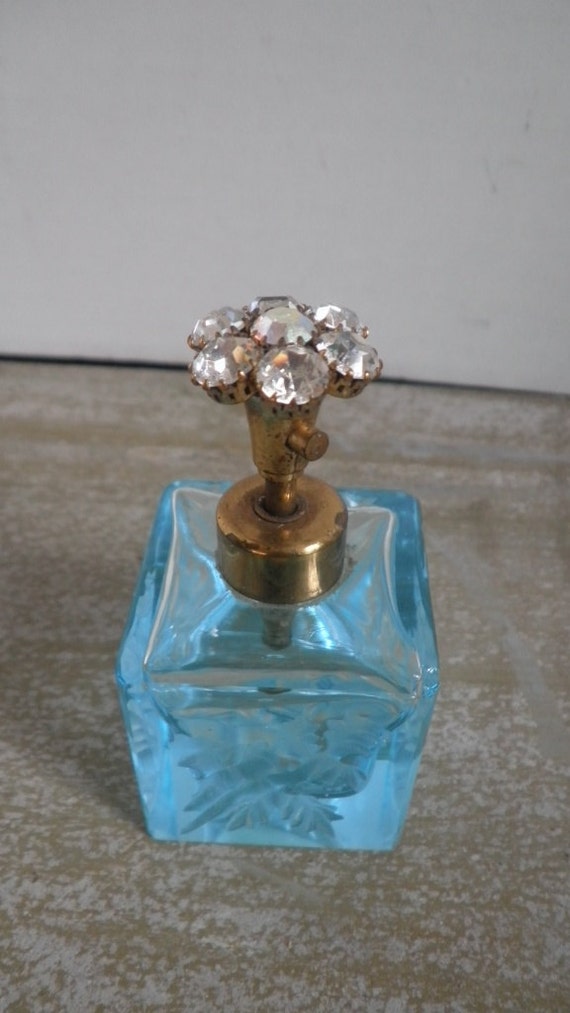 1930s perfume bottle with rose etched glass and gold sparkle top