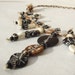 Black and brown bone and natural hemp Necklace, mock suede, wood, plaited knotted twine.