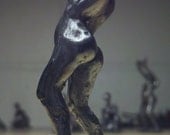 Dancing bronze figure