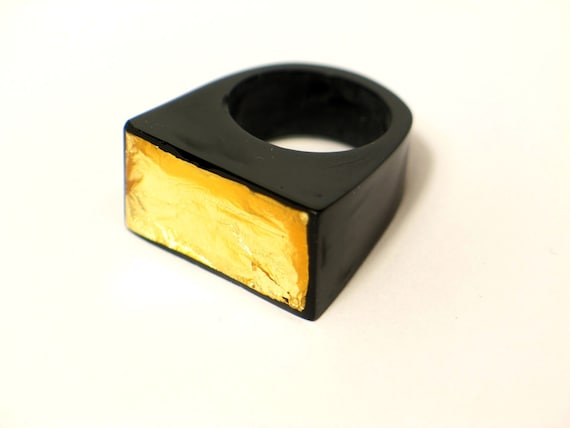 Black and gold ring
