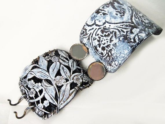 Sophia. White Patina Cuff with stamping over cowhide, etched salvaged tin and mirror buttons.