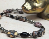 Leopard Stone Obsidian Pyrite necklace in Native American inspired pattern, beautiful Leopardskin Jasper gemstones.