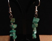 Floating stone emerald drop earrings