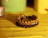 Golden Spices - Bracelet made of asian orange and green beads, black strass, golden chain. Original and chic