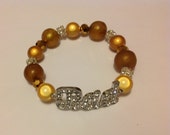 Rhinestone 'Bad' Bracelet With Iridescent Topaz Beads. Fits Most Wrists.