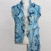 Sky, an Eleganza Scarf in blue made from thrums