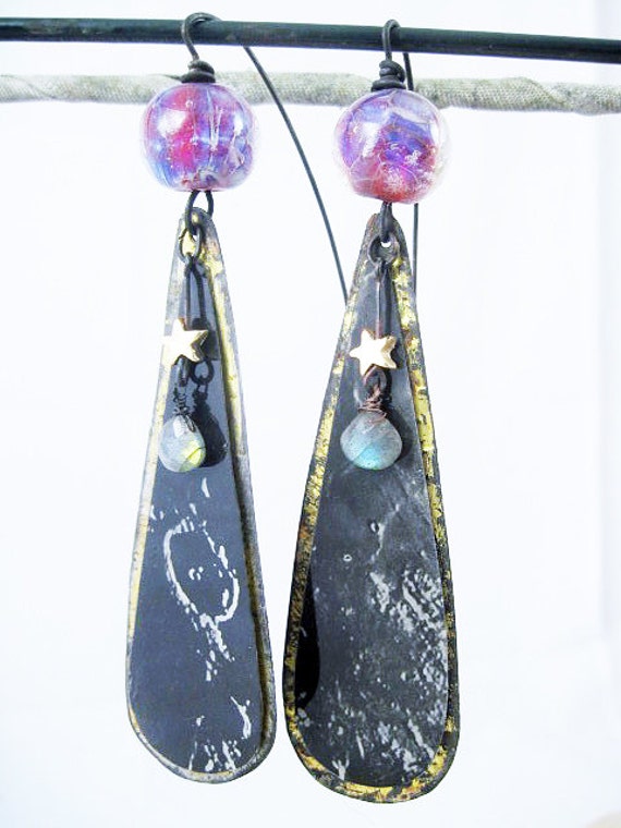 In the Stillness. Moon drops on tin and resined paper with labradorite and iridescent lampwork.