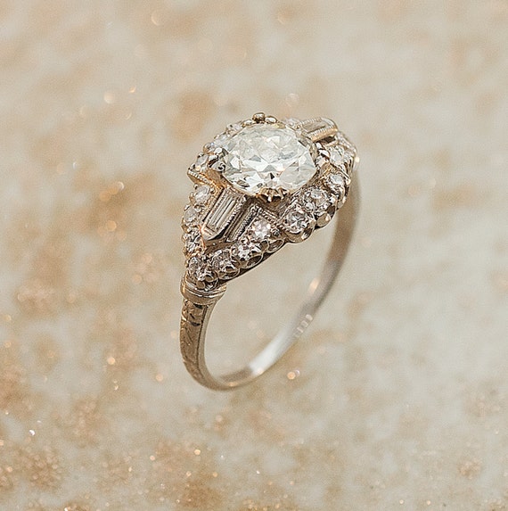 over 1 carat diamond antique engagement ring set in platinum with large center stone