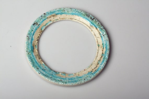 Round frame in stoneware Royal porcelain and melted by madebymanos