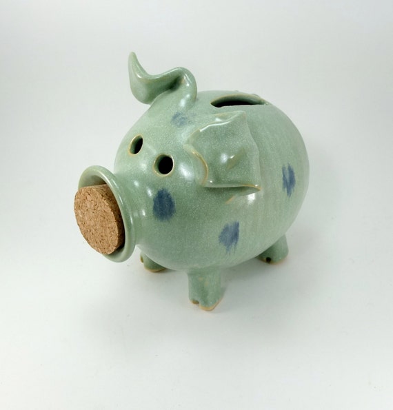 spotted light green piggy bank